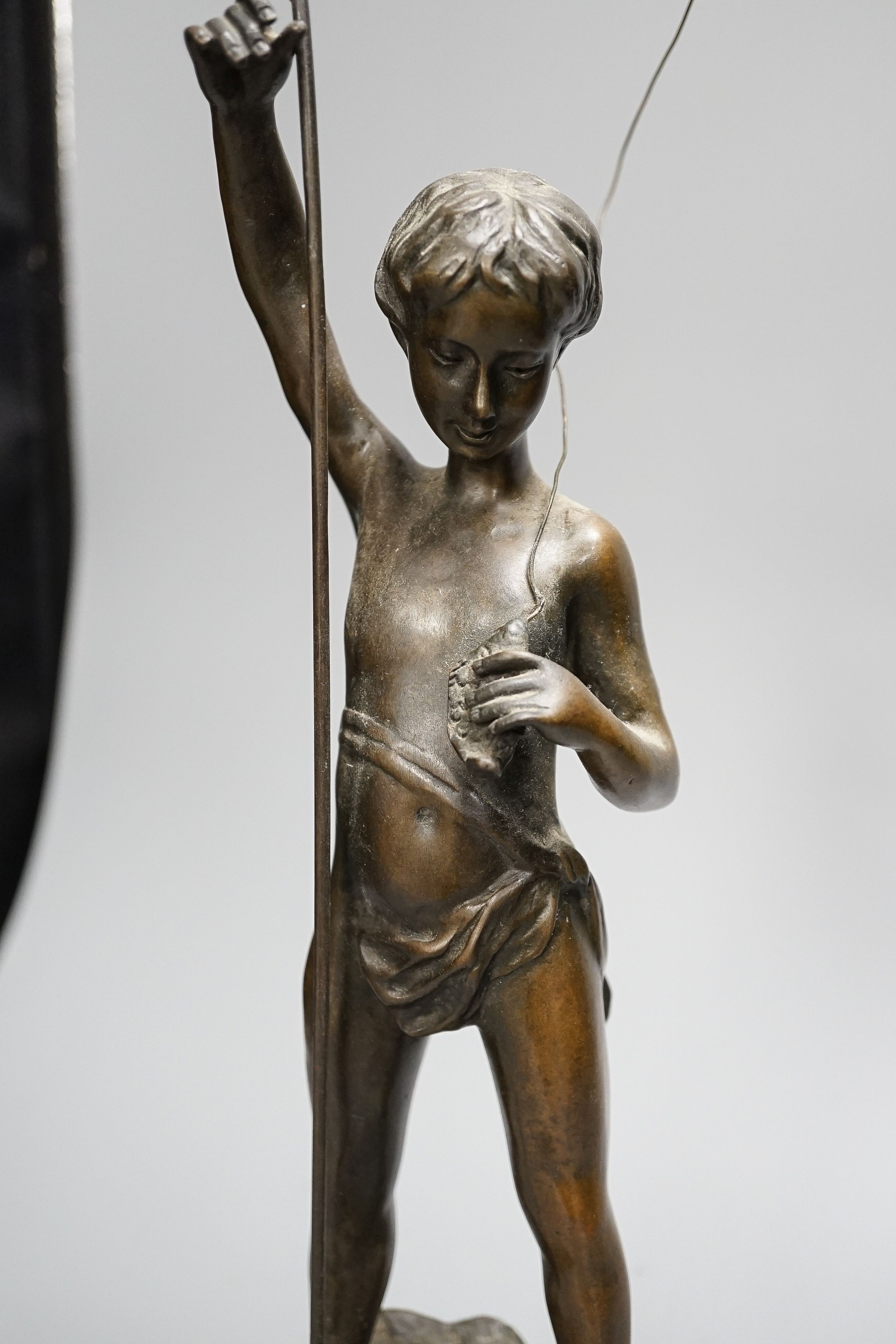 A bronze figure of a young fisherman, height 44cm